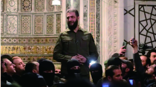 Al-Jolani, leader of the opposition forces, speaks at a mosque in central Damascus on Dec. 8. Screenshot and caption from BBC News Japan, Dec. 9, 2024.