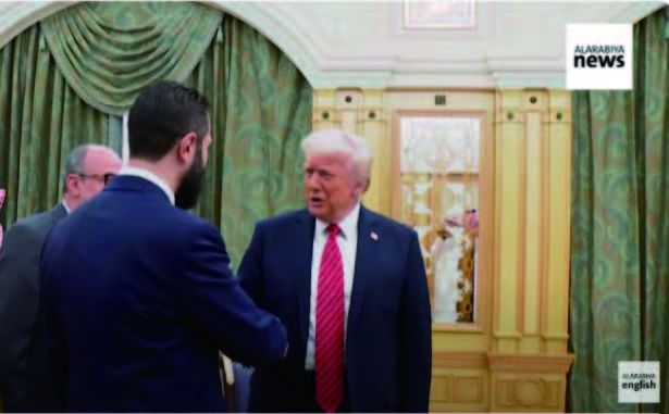 President Trump warmly welcomes Al-Sharaa before their talks.